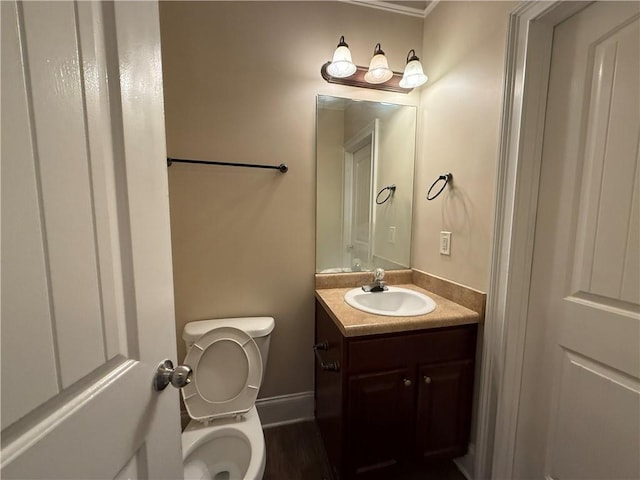 381 Plymstock Dr, Mcdonough, GA 30253 - bathroom with vanity, toilet, and baseboards