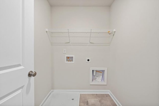 clothes washing area with hookup for an electric dryer and hookup for a washing machine