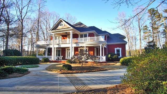 greek revival inspired property featuring covered porch