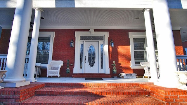 entrance to property with a porch