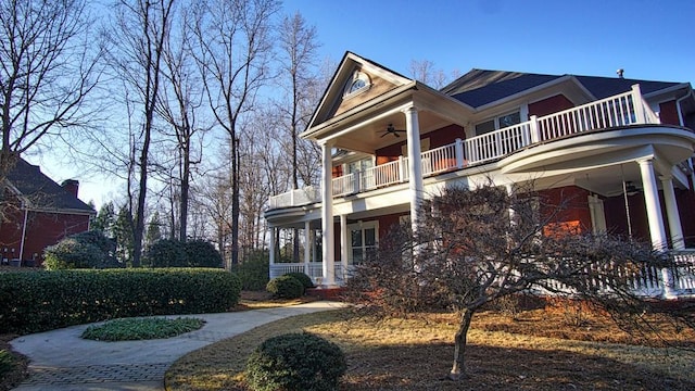 view of front of property with a balcony