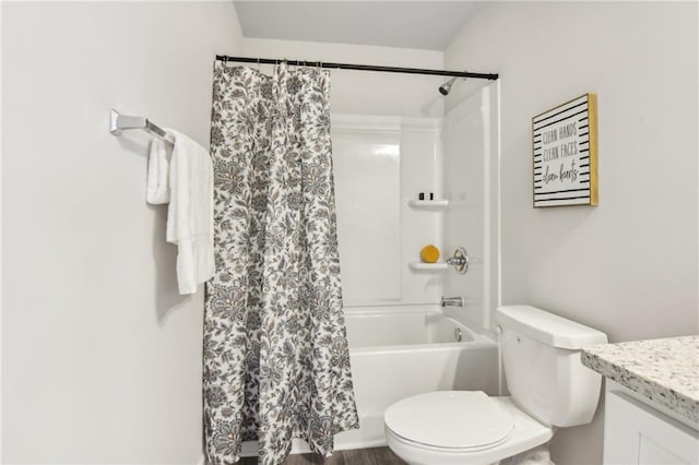 2527 Swan Lake Dr, Grayson, GA 30017 - bathroom featuring toilet, shower / bath combo with shower curtain, and vanity