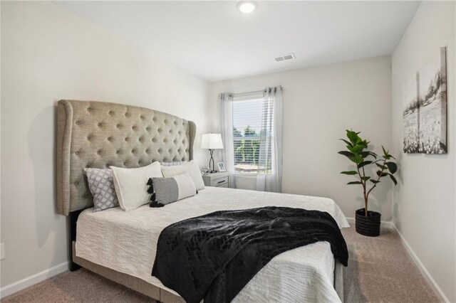 bedroom featuring carpet flooring