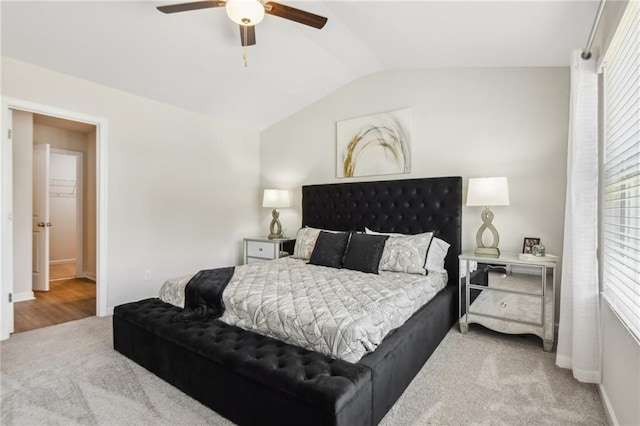 2527 Swan Lake Dr, Grayson, GA 30017 - bedroom with carpet floors, baseboards, ceiling fan, and vaulted ceiling