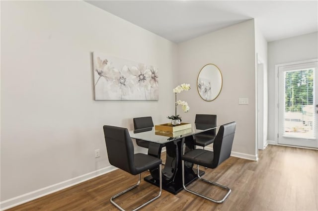 2527 Swan Lake Dr, Grayson, GA 30017 - dining area featuring baseboards and wood finished floors
