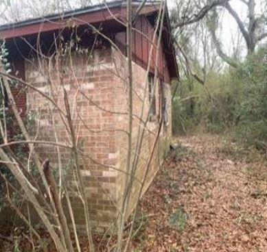 151 Rosa Parks St, Camden, AL 36726 - view of property exterior with brick siding