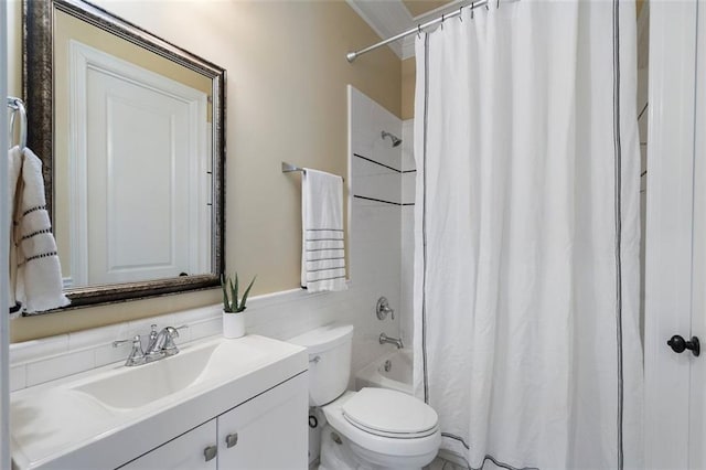 full bathroom with vanity, shower / bath combo, and toilet