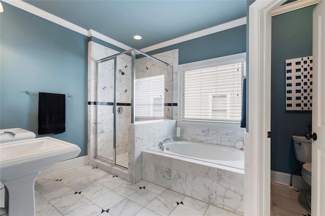 bathroom with ornamental molding, toilet, and independent shower and bath