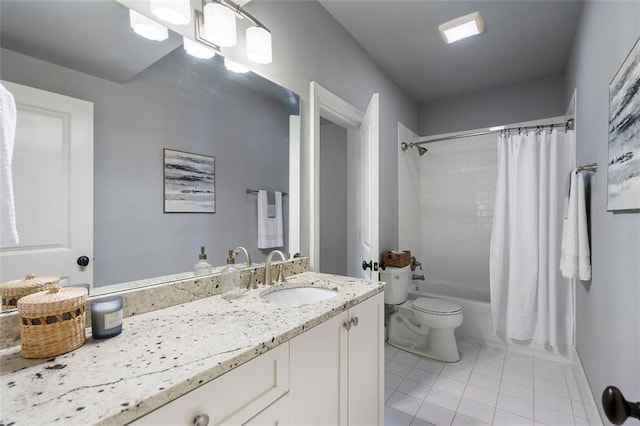 full bathroom featuring shower / tub combo, vanity, toilet, and tile patterned flooring