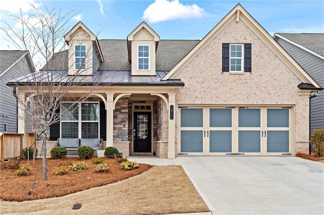 view of front of property with a garage