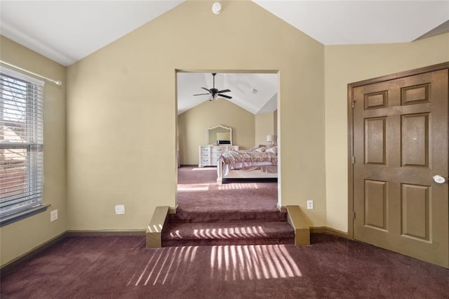 carpeted bedroom featuring vaulted ceiling