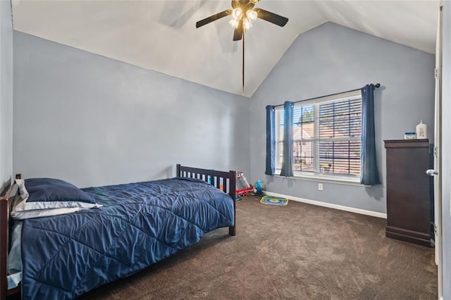 carpeted bedroom with vaulted ceiling and ceiling fan