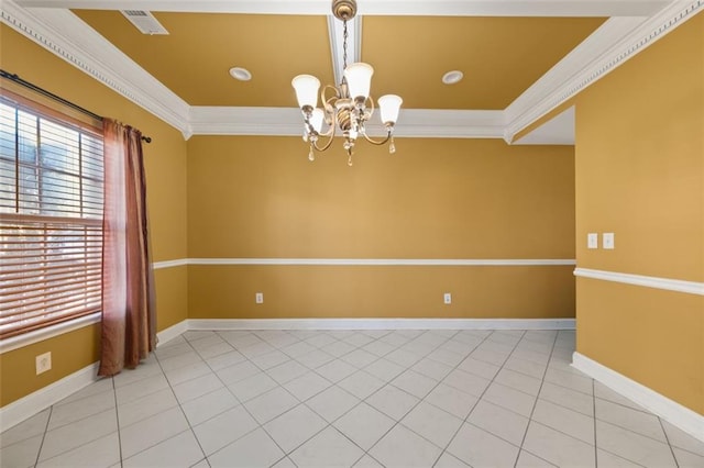 spare room with a chandelier, a healthy amount of sunlight, and ornamental molding