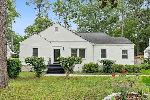 view of front of home with a front yard