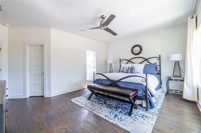 bedroom featuring ceiling fan and dark hardwood / wood-style floors