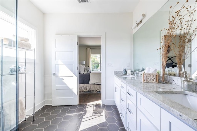 bathroom featuring vanity and tile patterned floors