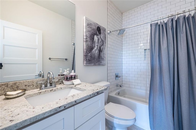 full bathroom featuring vanity, shower / tub combo with curtain, and toilet