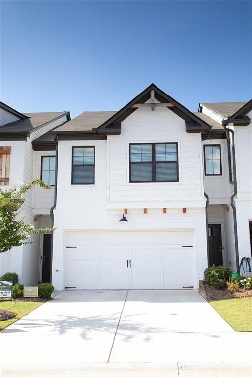 view of front of property with a garage