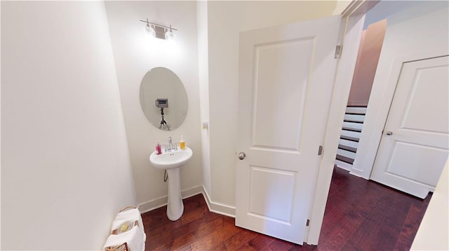 bathroom featuring hardwood / wood-style flooring and sink