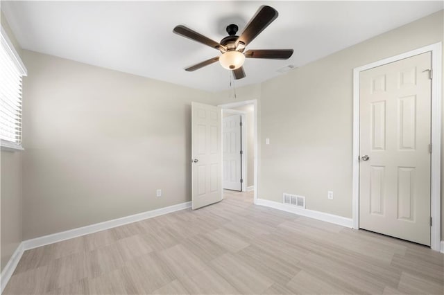 2159 Fairburn Rd SW, Atlanta, GA 30331 - unfurnished bedroom featuring baseboards and a ceiling fan