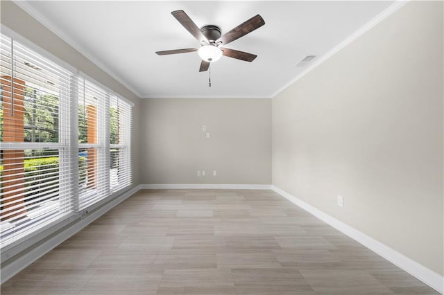 2159 Fairburn Rd SW, Atlanta, GA 30331 - empty room featuring a ceiling fan, ornamental molding, and baseboards