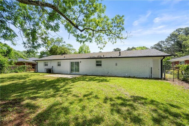 2159 Fairburn Rd SW, Atlanta, GA 30331 - back of property with brick siding and central AC unit