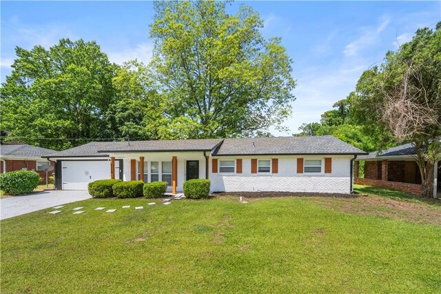 2159 Fairburn Rd SW, Atlanta, GA 30331 - ranch-style house with a garage, concrete driveway, a front lawn, and brick siding