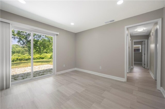 2159 Fairburn Rd SW, Atlanta, GA 30331 - spare room featuring baseboards, recessed lighting, and attic access