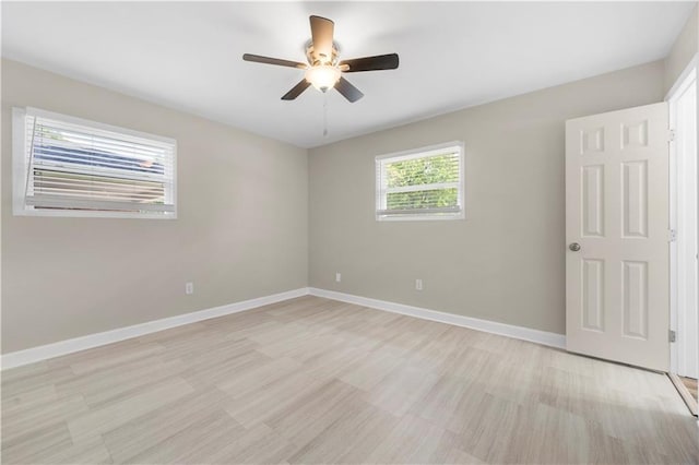 2159 Fairburn Rd SW, Atlanta, GA 30331 - unfurnished room featuring ceiling fan, baseboards, and light wood finished floors