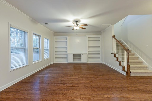 unfurnished living room featuring ceiling fan, dark wood-type flooring, and ornamental molding