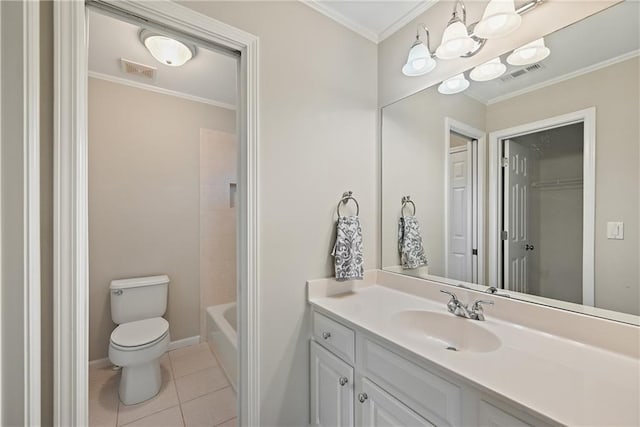 bathroom featuring tile patterned floors, vanity, ornamental molding, and toilet