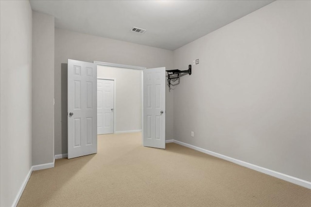 interior space with light colored carpet