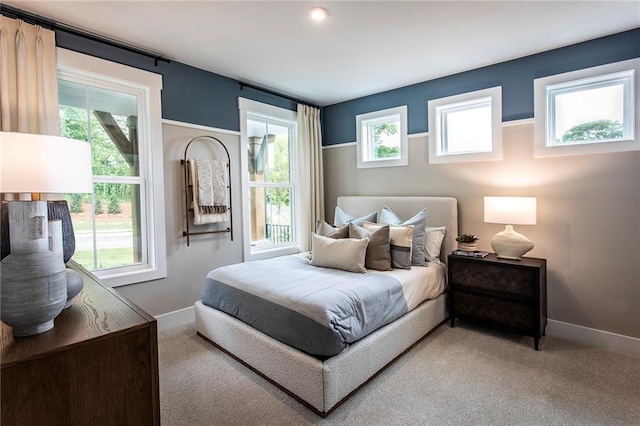 7505 Woolf Way, Cumming, GA 30028 - bedroom featuring light colored carpet and baseboards