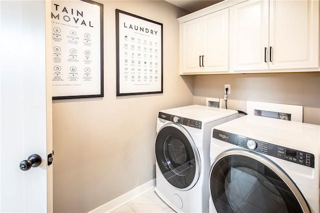 7505 Woolf Way, Cumming, GA 30028 - laundry area with washer and clothes dryer, cabinet space, light marble finish flooring, and baseboards
