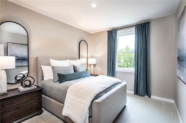 7505 Woolf Way, Cumming, GA 30028 - bedroom featuring light colored carpet and baseboards