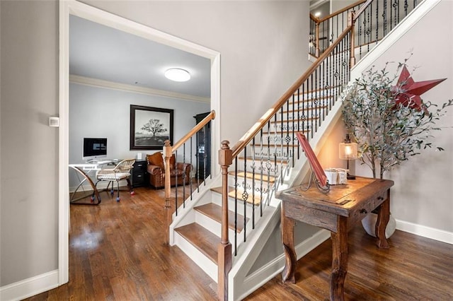 501 Rabun Ct, Canton, GA 30115 - staircase with ornamental molding, wood finished floors, and baseboards