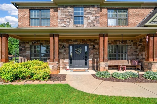 501 Rabun Ct, Canton, GA 30115 - property entrance with a porch and stone siding