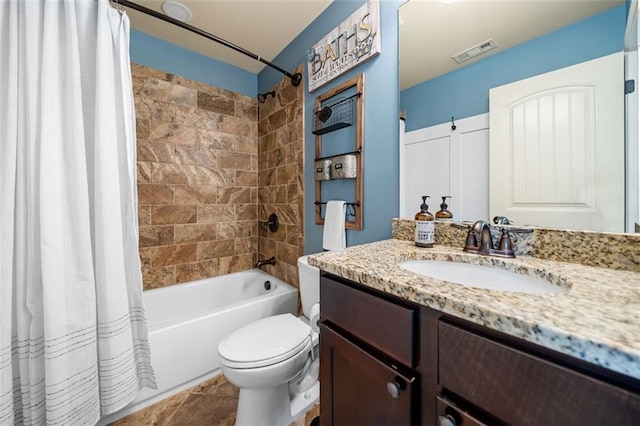501 Rabun Ct, Canton, GA 30115 - full bath with vanity, shower / bath combo with shower curtain, toilet, and tile patterned floors