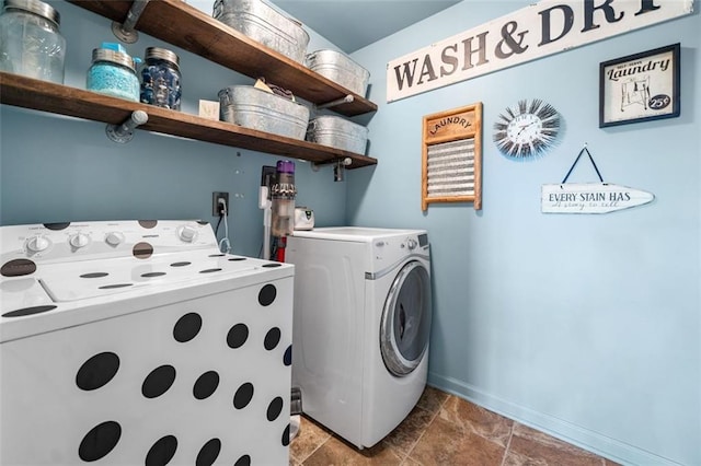 501 Rabun Ct, Canton, GA 30115 - laundry area featuring washing machine and clothes dryer and baseboards