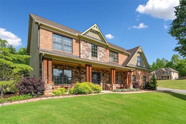 501 Rabun Ct, Canton, GA 30115 - craftsman-style house with covered porch, stone siding, and a front yard