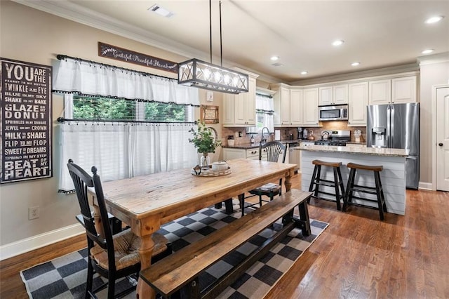 501 Rabun Ct, Canton, GA 30115 - dining room with crown molding, baseboards, recessed lighting, and dark wood-style flooring