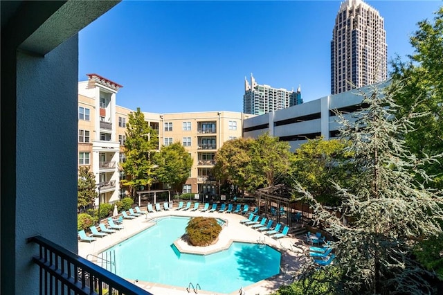 view of pool featuring a patio