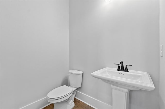 bathroom with toilet and sink