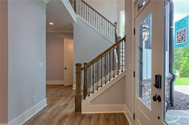 6449 Snelling Mill Rd, Flowery Branch, GA 30542 - entryway with wood finished floors, baseboards, stairs, and recessed lighting