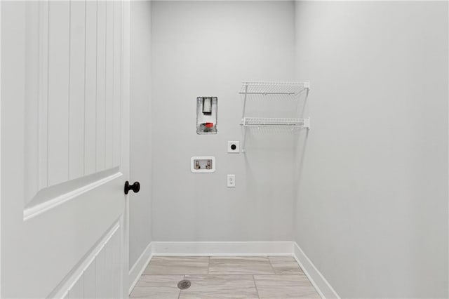 laundry room with washer hookup and electric dryer hookup