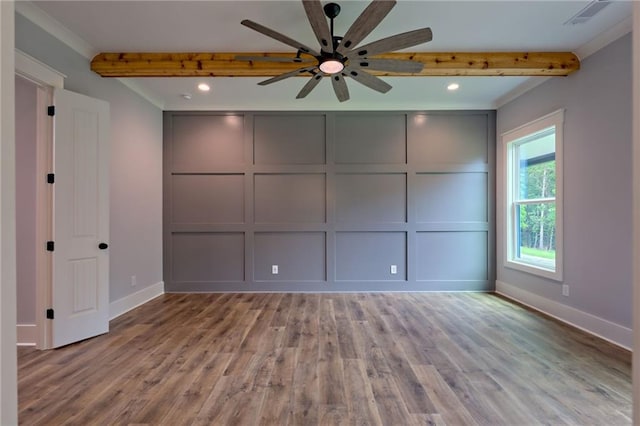 6449 Snelling Mill Rd, Flowery Branch, GA 30542 - empty room with beamed ceiling, a decorative wall, ceiling fan, wood finished floors, and recessed lighting