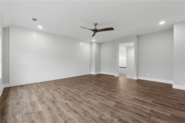 unfurnished room with ceiling fan and wood-type flooring