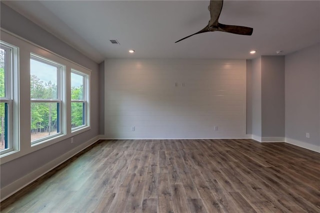 6449 Snelling Mill Rd, Flowery Branch, GA 30542 - spare room with wood finished floors, baseboards, recessed lighting, and ceiling fan