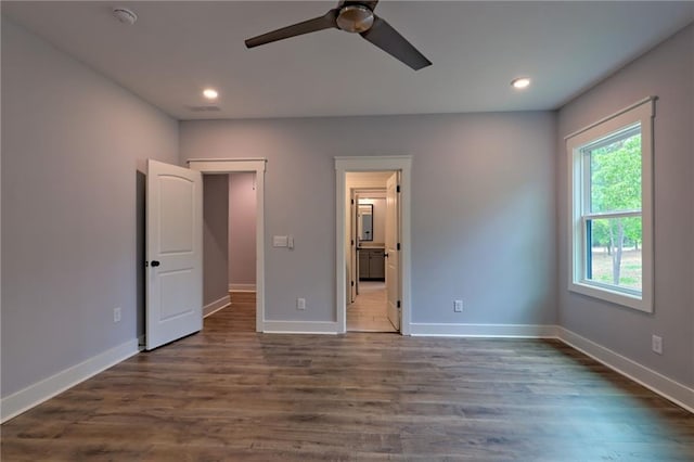 6449 Snelling Mill Rd, Flowery Branch, GA 30542 - unfurnished bedroom featuring baseboards, dark wood-type flooring, recessed lighting, a ceiling fan, and ensuite bath