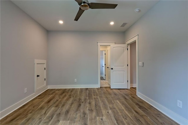 6449 Snelling Mill Rd, Flowery Branch, GA 30542 - unfurnished room featuring a ceiling fan, wood finished floors, baseboards, a smoke detector, and recessed lighting